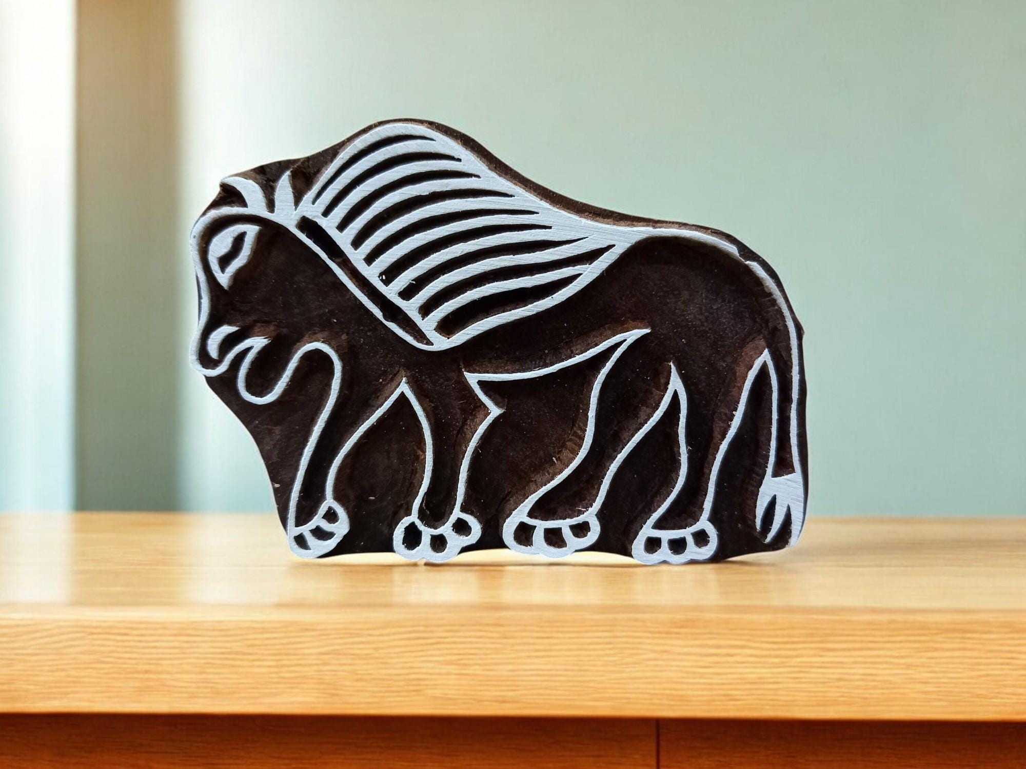 A Tribal Lion ,pottery stamp ceramic mold scrapbooking tjap batik printing floral carved stamps.