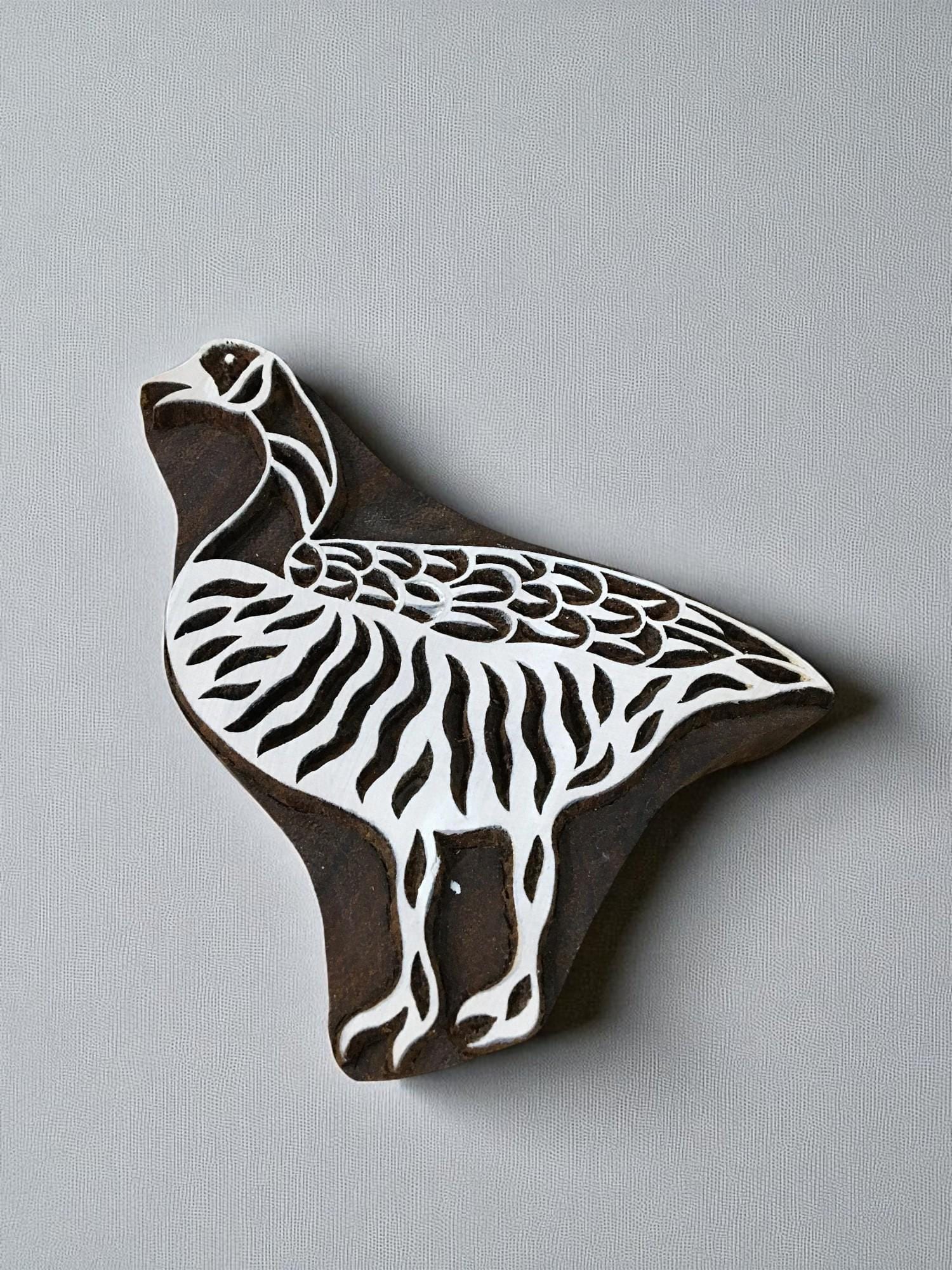 An Ostrich  hand carved Indian wood printing block; textile stamp; pottery stamp,