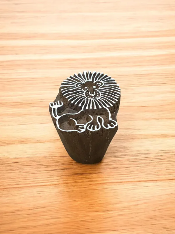 Sitting Lion, pottery stamp ceramic mould scrapbooking tjap batik printing floral carved stamps.