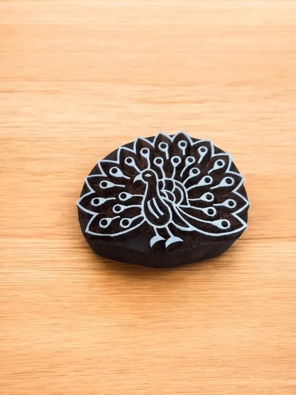 A Dancing Peacock ,pottery stamp ceramic mold scrapbooking tjap batik printing floral carved stamps.